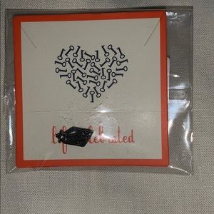 Hematite shooting star charm